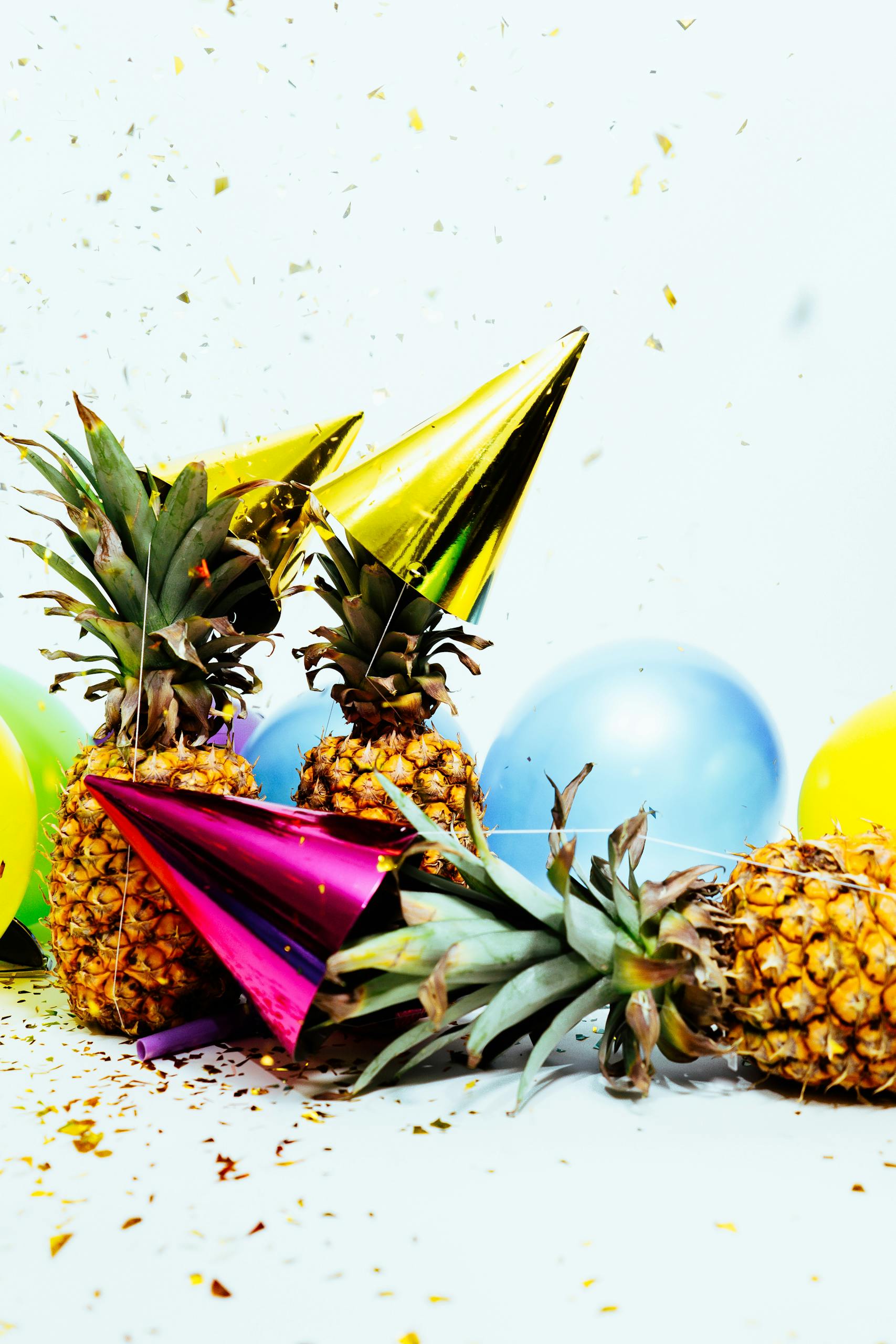 Three Pineapples With Gold Party Hats